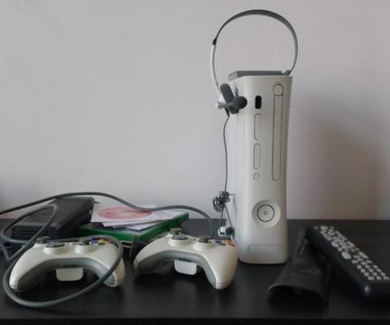 Complete Xbox 360 inc o,a. games, headset, controllers