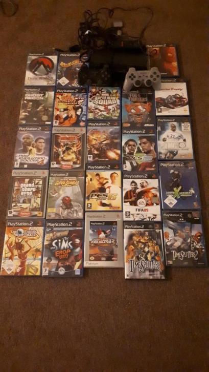 Playstation 2 + 23 games & controllers
