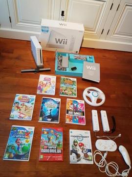 Wii + 8 spellen Mario Kart, Super Mario Bros en extra's!!
