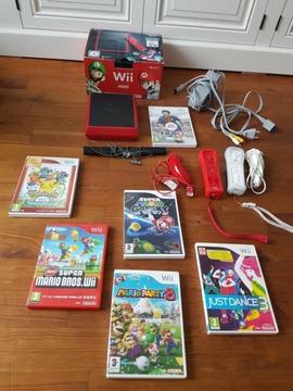 Wii (rood) + 6 spellen oa Super Mario Bros + 2 controllers!!