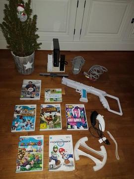 Wii + 7 spellen Mario Kart, Just Dance, Mario Party 8 etc