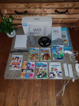 Wii + doos + 7 spellen Mario Kart, Mario Party 8 etc ZGAN!!
