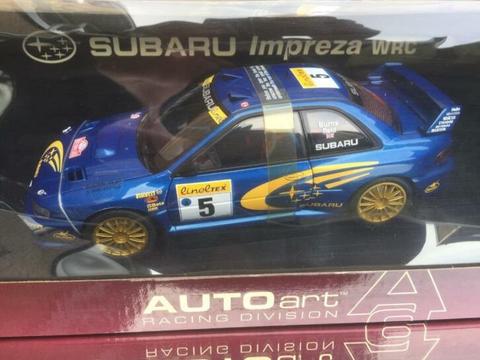 NIEUWE SUBARU IMPREZA WRC 1999 RALLY M.C. #5 AUTOART In Box