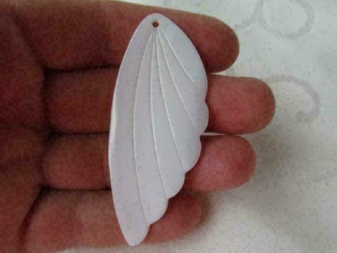 nieuwe hanger vleugel gemaakt van schelp